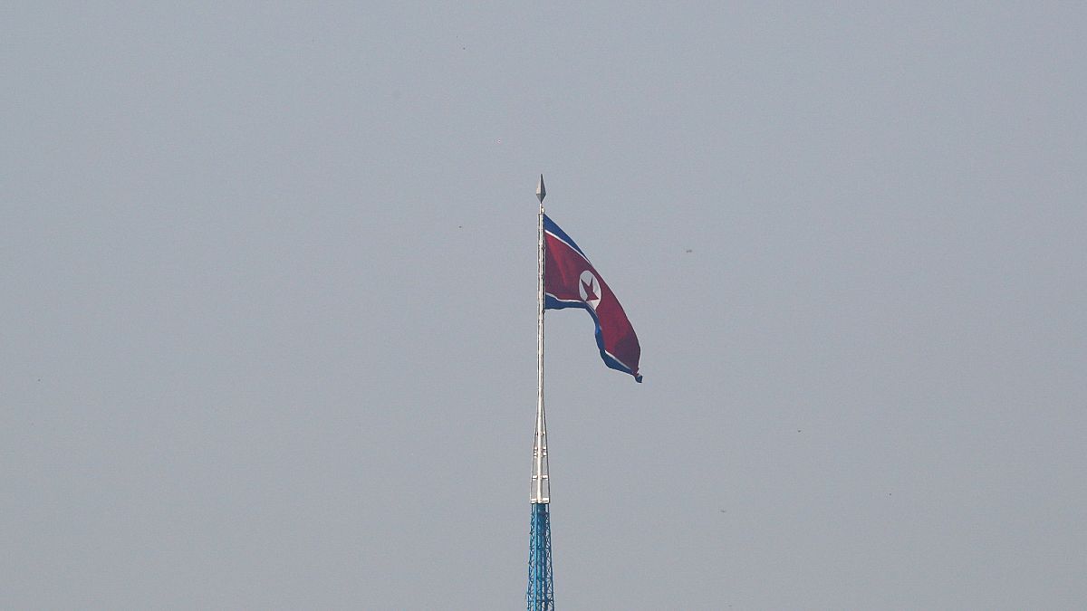 A North Korean flag flutters on top of a tower at North Korea's propaganda village of Gijungdong, as seen from Paju, South Korea, September 30, 2019.