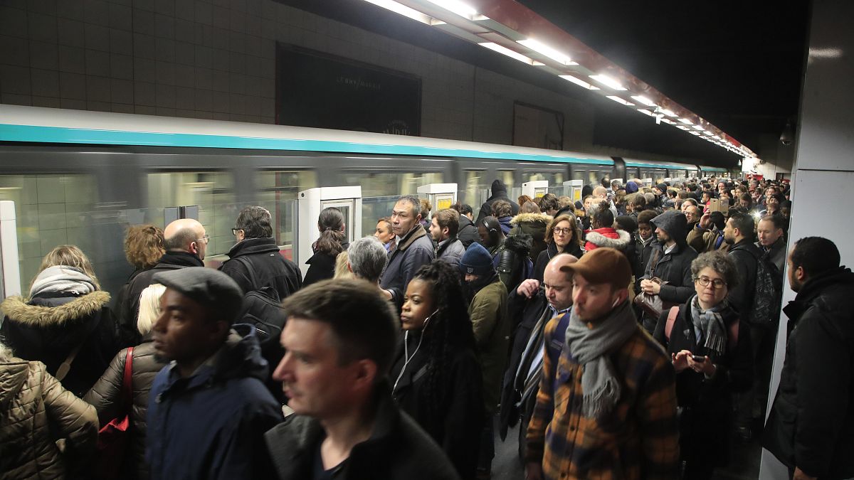Paris metro workers to pause pension strike to 'recharge batteries' and ...