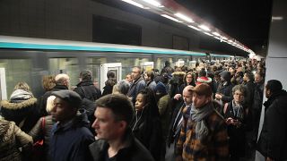 Paris metro workers to pause pension strike to 'recharge batteries' and re-orient movement
