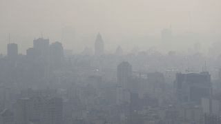 Air pollution blankets the skyline in Tehran, Iran, in November 2019