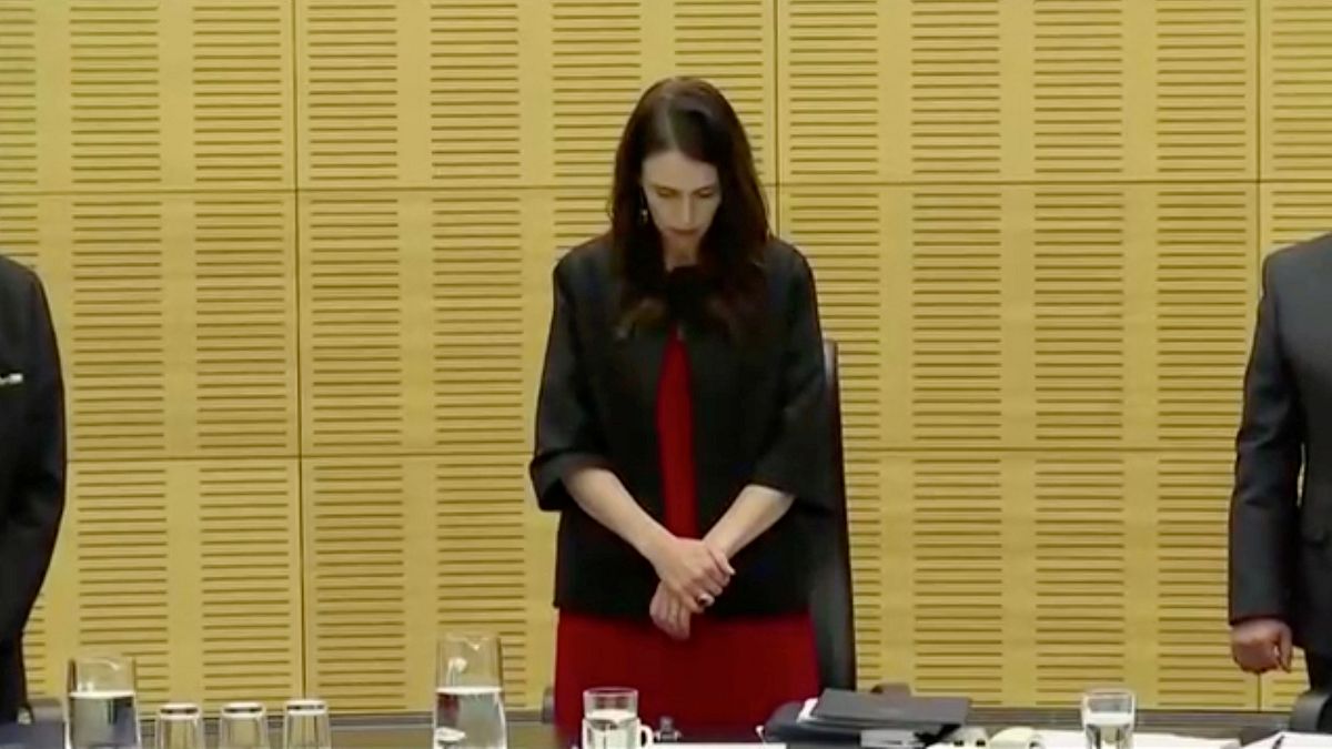 New Zealand's Prime Minister Jacinda Ardern observes a minute of silence, to mark one week since the deadly eruption of White Island, in Wellington, New Zealand