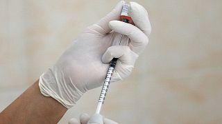 A nurse fills a syringe with a vaccine before administering an injection at a children's clinic in Kiev, Ukraine August 14, 2019. Picture taken August 14, 2019.