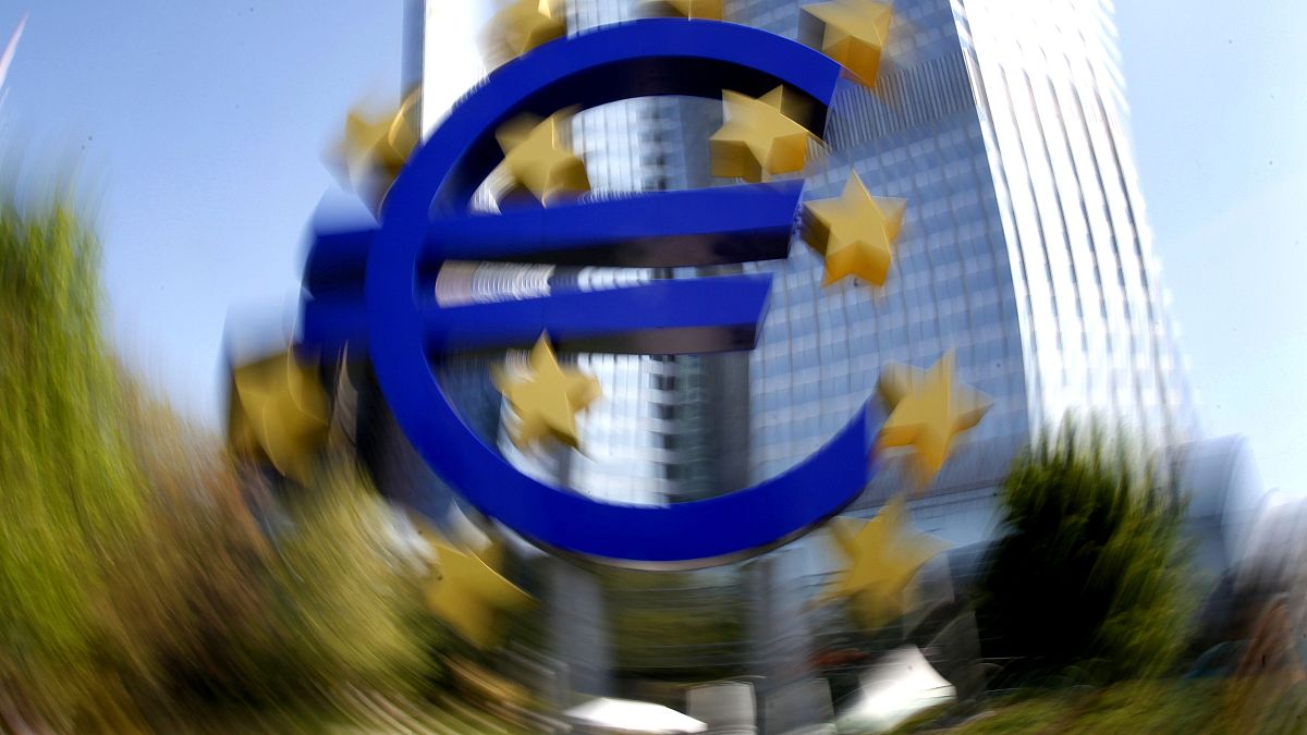 The Euro sculpture in front of the European Central Bank is seen in Frankfurt, central Germany, Wednesday, April 28, 2010. (AP Photo/Michael Probst)