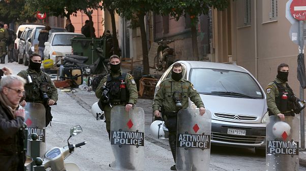 Αστυνομικοί επιτηρούν την διαδικασία εκκένωσης κτιρίων στο Κουκάκι ΑΠΕ ΜΠΕ/ΑΠΕ ΜΠΕ/Παναγιώτου Ορέστης Αστυνομικοί επιτηρούν την διαδικασία εκκένωσης κτιρίων στο Κουκάκι ΑΠΕ ΜΠΕ/ΑΠΕ ΜΠΕ/Παναγιώτου Ορέστης