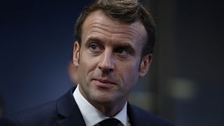 France's Macron will not abandon controversial pension reforms but is open to compromise