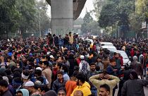 Protesters outside Jamia Millia Islamia university in Delhi