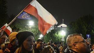 Demonstrators hold a rally to protest against changes to Poland's judiciary planned by the ruling Law and Justice party near the building of parliament in Warsaw, Poland.