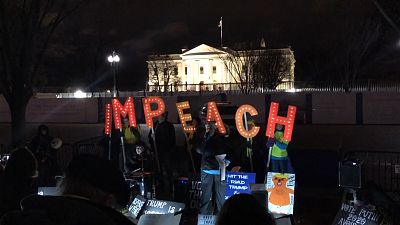 Impeachment supporters sing outside White House