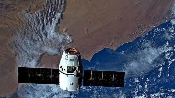 Astronaut Luca Parmitano snares his first Dragon supply spacecraft Astronaut Luca Parmitano snares his first Dragon supply spacecraft