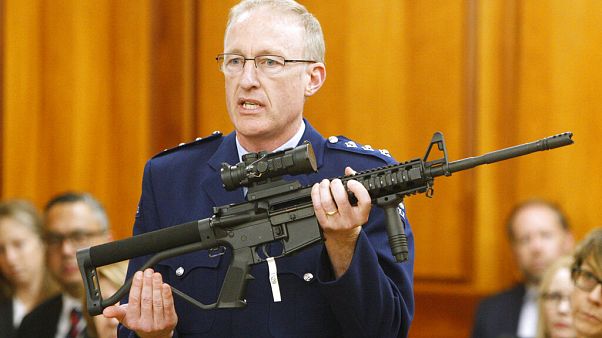 Police chief Mike McIlraith shows New Zealand MPs an AR-15 style rifle similar to one of the weapons a gunman used to kill 51 worshippers at two New Zealand mosques Police chief Mike McIlraith shows New Zealand MPs an AR-15 style rifle similar to one of the weapons a gunman used to kill 51 worshippers at two New Zealand mosques