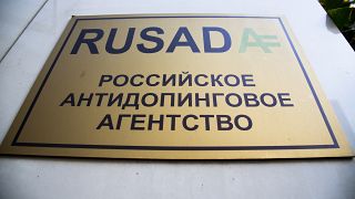 A sign reading "Russian National Anti-doping Agency RUSADA" on a building in Moscow, Russia.