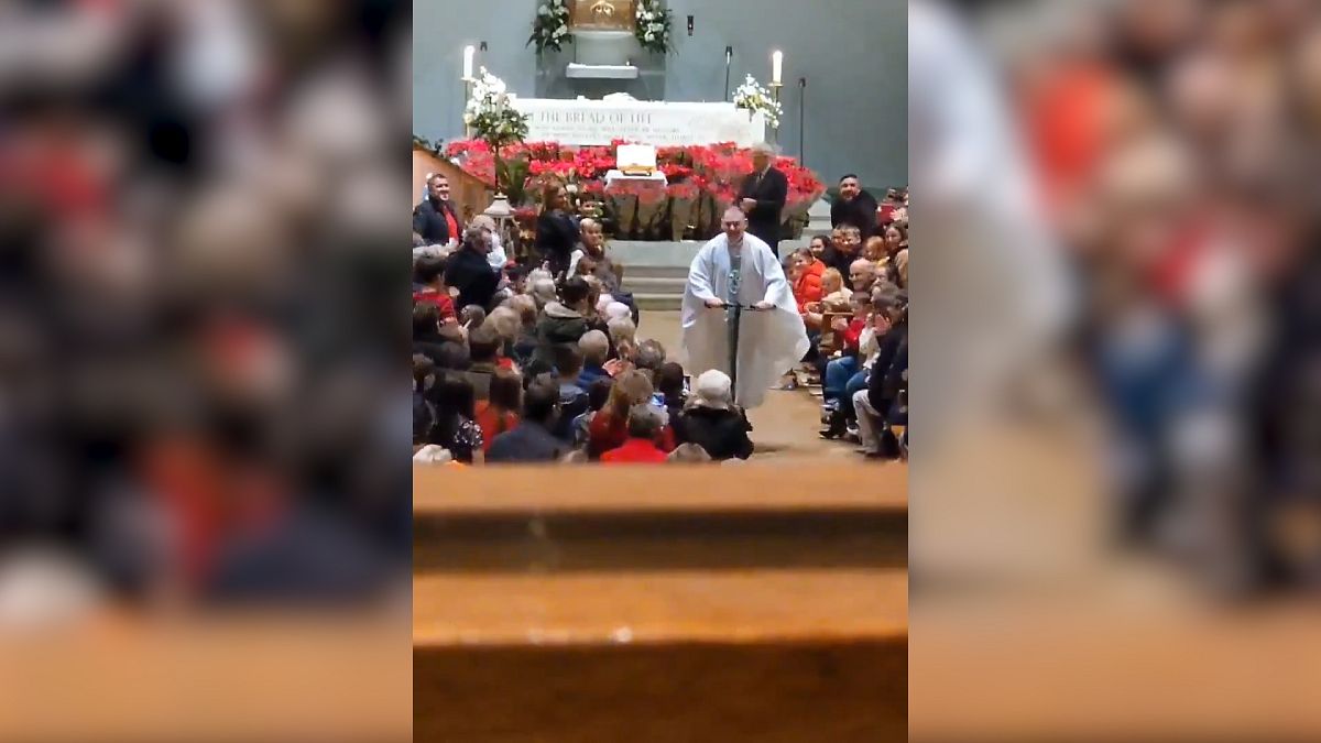 Irish priest on wheels scoots out of Christmas Eve mass
