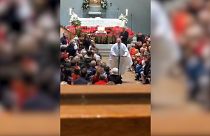 Irish priest on wheels scoots out of Christmas Eve mass