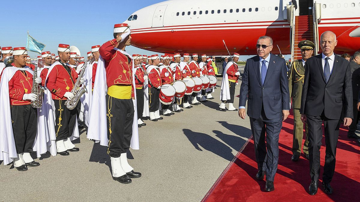 Turkey's Erdogan, left and Tunisian President Kais Saied, in Tunis