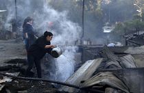 Şili'de orman yangınında evi küle dönen bir kadın