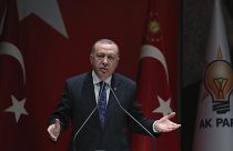 Turkey's President Recep Tayyip Erdogan addresses the members of his ruling party, in Ankara, Turkey, Thursday, Dec. 26, 2019.