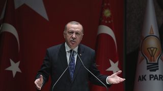 Turkey's President Recep Tayyip Erdogan addresses the members of his ruling party, in Ankara, Turkey, Thursday, Dec. 26, 2019.