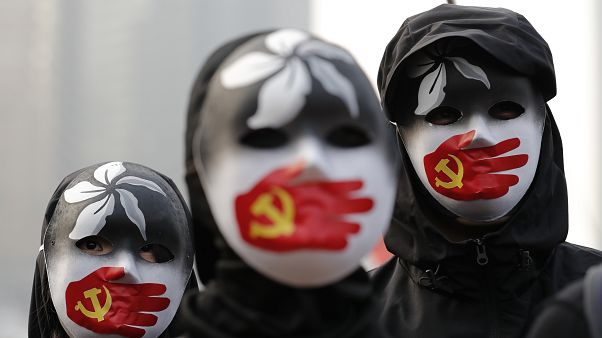 Hong Kong'da Uygurlara destek gösterisi Hong Kong'da Uygurlara destek gösterisi