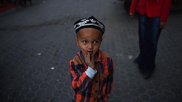 Doğu Türkistan'ın Hoten kentinde bir Uygur çocuk Doğu Türkistan'ın Hoten kentinde bir Uygur çocuk