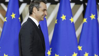 Greek Prime Minister Kyriakos Mitsotakis arrives for an EU summit in Brussels, Thursday, Dec. 12, 2019. 