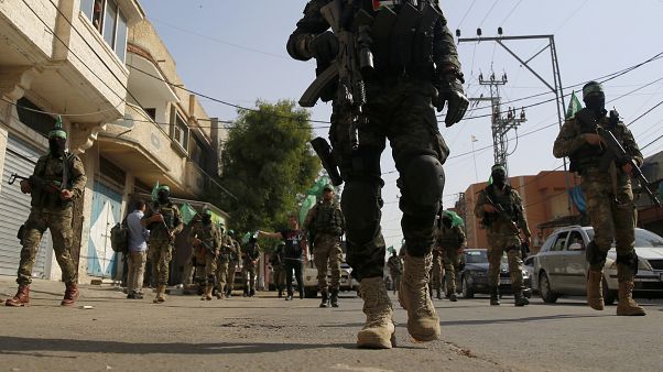 عانصر من حركة حماس في مسيرة في بلدة خان يونس جنوب قطاع غزة عانصر من حركة حماس في مسيرة في بلدة خان يونس جنوب قطاع غزة
