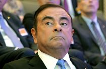 FILE - In this Oct. 6, 2017, file photo, former Nissan Motor chariman Carlos Ghosn attend a media conference outside Paris, France.