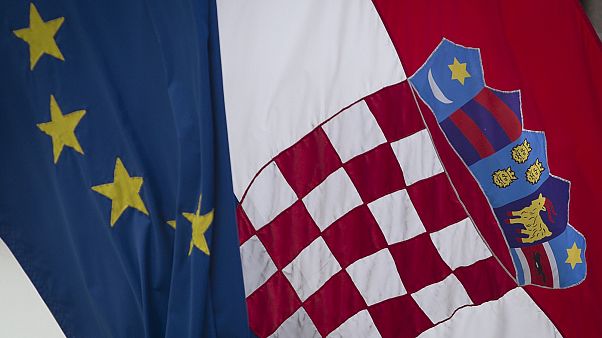 Croatian and the EU flags Croatian and the EU flags