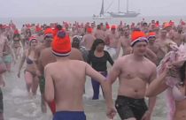 Dutch courage: Thousands plunge into North Sea for New Year's Day dip