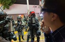 Hong Kong lawmaker gets pepper spray in the face as protests continue