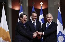 Greece’s Prime Minister Kyriakos Mitsotakis, center, Cypriot President Nicos Anastasiadis left and Israeli Prime Minister Benjamin Netanyahu