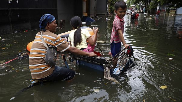 Sobe número de vítimas mortais das cheias na Indonésia Sobe número de vítimas mortais das cheias na Indonésia