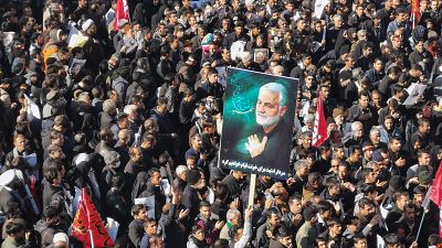 Iranian mourners gather for the burial of slain top general Qasem Soleimani in his hometown Kerman on January 7, 2020. Iranian mourners gather for the burial of slain top general Qasem Soleimani in his hometown Kerman on January 7, 2020.