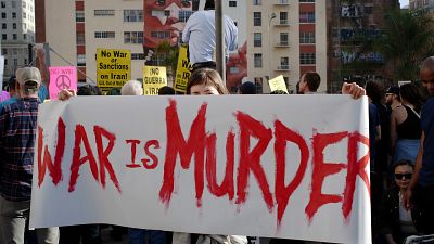 Activists gather in Pershing Square to protest recent U.S. military actions in Iraq (AP Photo/Damian Dovarganes) Activists gather in Pershing Square to protest recent U.S. military actions in Iraq (AP Photo/Damian Dovarganes)