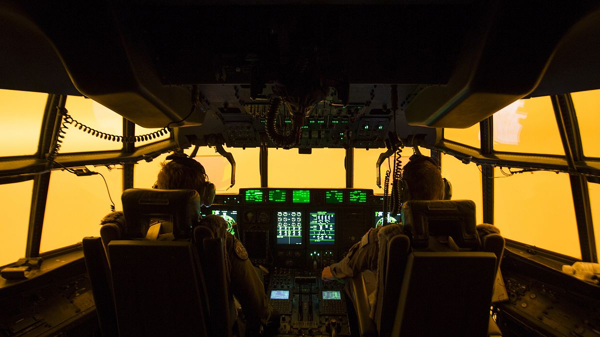 The flight deck of a C-130J Hercules aircraft prepares to land at Merimbula airfield to deploy Fire and Rescue crews. 
