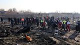 Rescue teams work at the scene after a Ukrainian plane carrying 176 passengers crashed near Imam Khomeini airport in the Iranian capital Tehran on January 8, 2020.