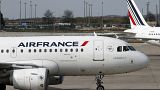 Air France planes are parked on the tarmac at Paris Charles de Gaulle airport, in Roissy, near Paris, Saturday, April 7, 2018.