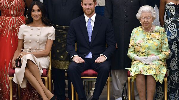 Queen Elizabeth II with the Duke and Duchess of Sussex at the Queen's Young Leaders Awards Ceremony at Buckingham Palace, London, Tuesday June 26, 2018. Queen Elizabeth II with the Duke and Duchess of Sussex at the Queen's Young Leaders Awards Ceremony at Buckingham Palace, London, Tuesday June 26, 2018.