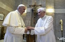 Pope Francis, left, and Pope Emeritus Benedict XVI, meet each other on the occasion of the elevation of five new cardinals