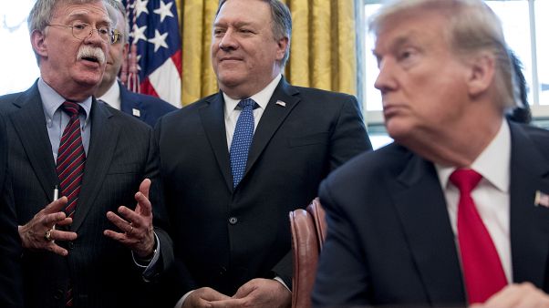 John Bolton, accompanied by Secretary of State Mike Pompeo, and President Donald Trump John Bolton, accompanied by Secretary of State Mike Pompeo, and President Donald Trump