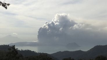 Black smoke spews out of Philippines volcano as Manila airport closes