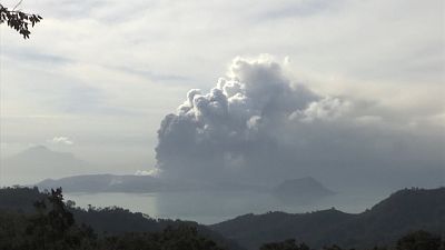 Black smoke spews out of Philippines volcano as Manila airport closes