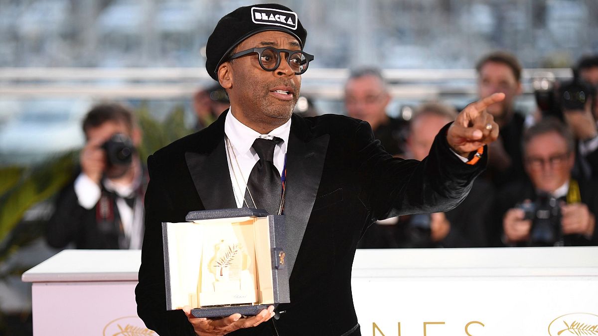 Spike Lee with his Grand Prix award at Cannes in 2018