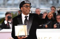 Spike Lee with his Grand Prix award at Cannes in 2018