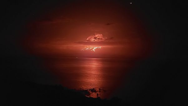 In this HO provided by Galapagos National Park, shows Volcan La Cubre eruption In this HO provided by Galapagos National Park, shows Volcan La Cubre eruption
