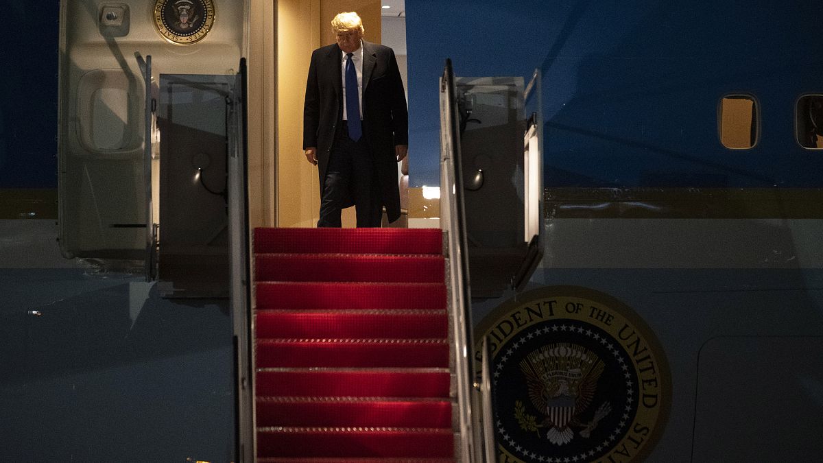 President Donald Trump exits Air Force One on Tuesday, Jan. 14, 2020, at Andrews Air Force Base, Md., following a campaign event in Milwaukee.  (AP Photo/Kevin Wolf)