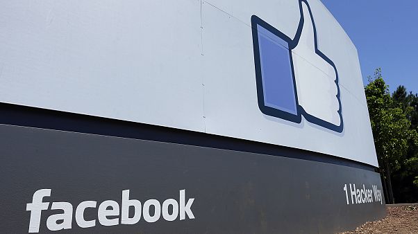 FILE - This July 16, 2013 file photo shows a sign at Facebook headquarters in Menlo Park, California FILE - This July 16, 2013 file photo shows a sign at Facebook headquarters in Menlo Park, California