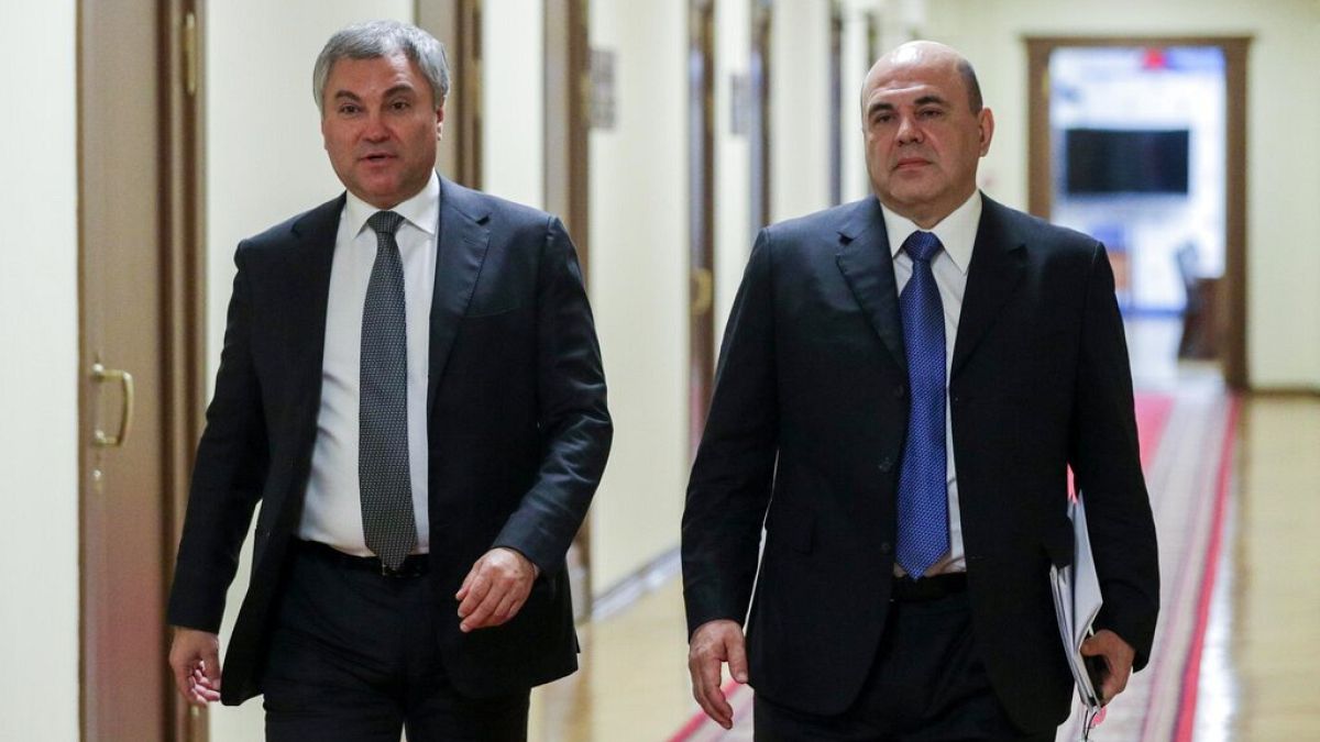 Putin's nominee for Russia PM Mikhail Mishustin, right, with Russian State Duma speaker Vyacheslav Volodin