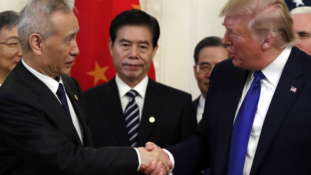 President Donald Trump and Chinese Vice Premier Liu He sign “phase one” of a US China trade agreement