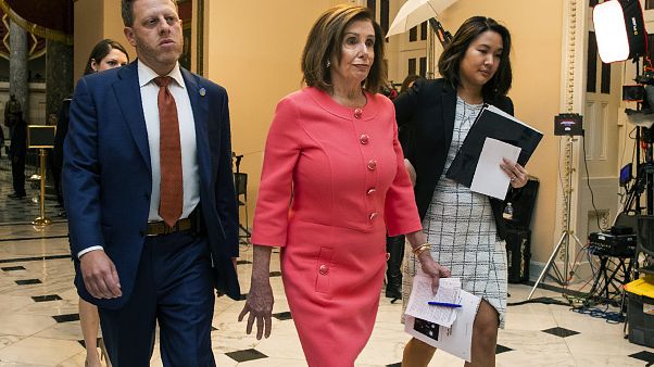 House Speaker Nancy Pelosi of Calif., centre, walks towards the House Chamber on Capitol Hill, Wednesday, Jan. 15, 2020, in Washington. House Speaker Nancy Pelosi of Calif., centre, walks towards the House Chamber on Capitol Hill, Wednesday, Jan. 15, 2020, in Washington.
