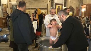 Watch: 500 babies baptised in Georgian mass ceremony